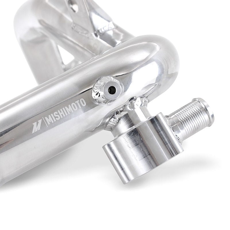 Close-up of a Mishimoto metal component on a white background