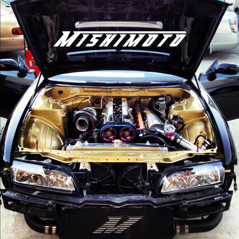 High-performance car engine with Mishimoto parts, gold engine bay, LynXautoinnovate USA