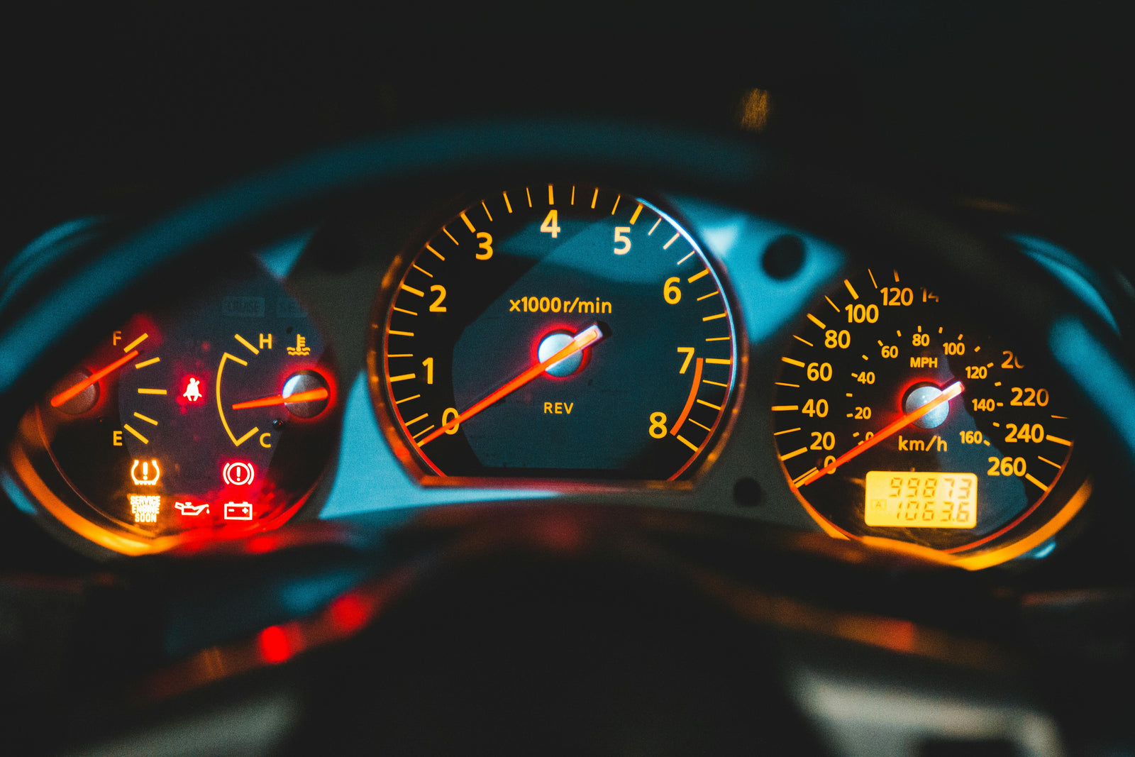 Car dashboard with ABS warning lights, rpm and speed gauges, LynXautoinnovate auto parts USA