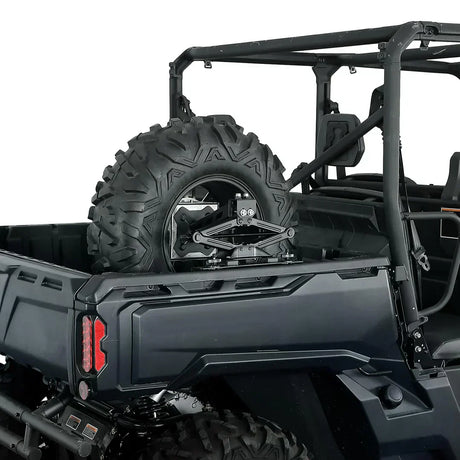 Side view of an off-road utility vehicle with spare tire mounted in cargo bed, LynXautoinnovate automotive parts USA.