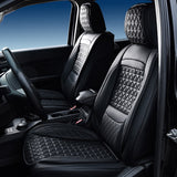 Black diamond stitched car seat covers inside a vehicle with a clear blue sky outside.