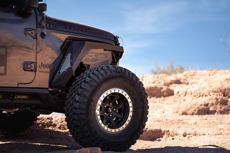 Featuring the Fender on a Gunmetal Jeep in the rocky environment