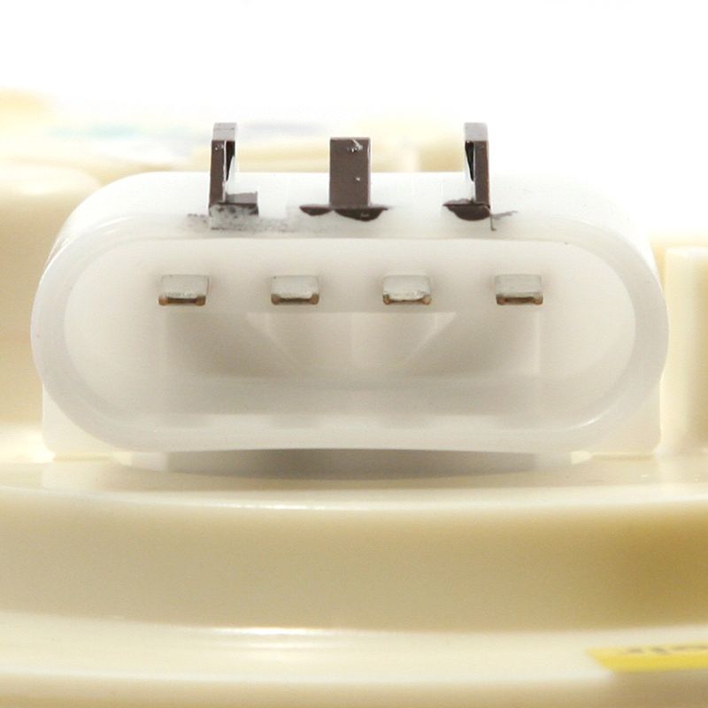 Close-up of a white electronic component on a beige background