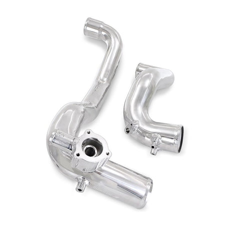 Chrome automotive intercooler manifold on a white background