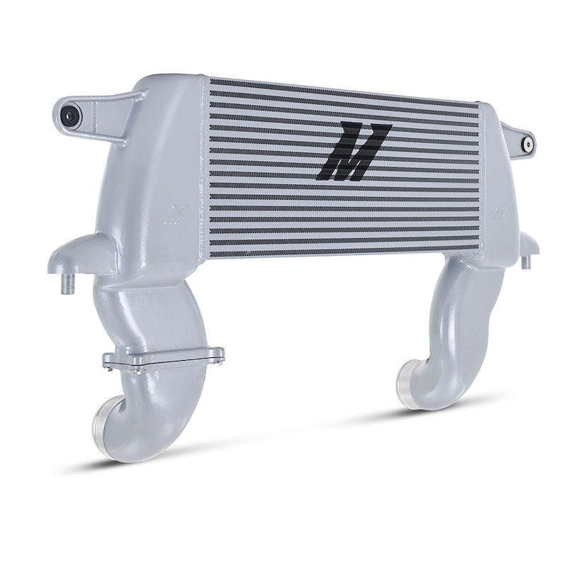 An M2 intercooler with a silver aluminum housing and black striped radiator core, shown on a white background.