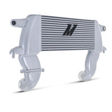 An M2 intercooler with a silver aluminum housing and black striped radiator core, shown on a white background.