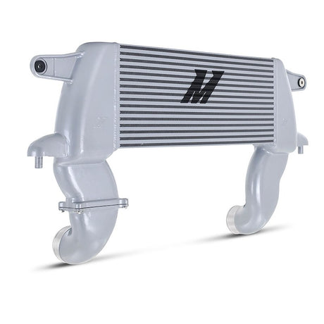 An M2 intercooler with a silver aluminum housing and black striped radiator core, shown on a white background.