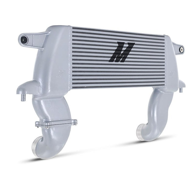 An M2 intercooler with a silver aluminum housing and black striped radiator core, shown on a white background.