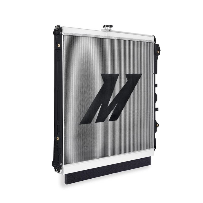 Toyota Tundra radiator with a prominent 'M' logo in the center with a white background