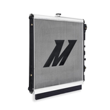 Toyota Tundra radiator with a prominent 'M' logo in the center with a white background