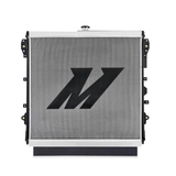 Transmission cooler with a prominent 'M' logo with a white background
