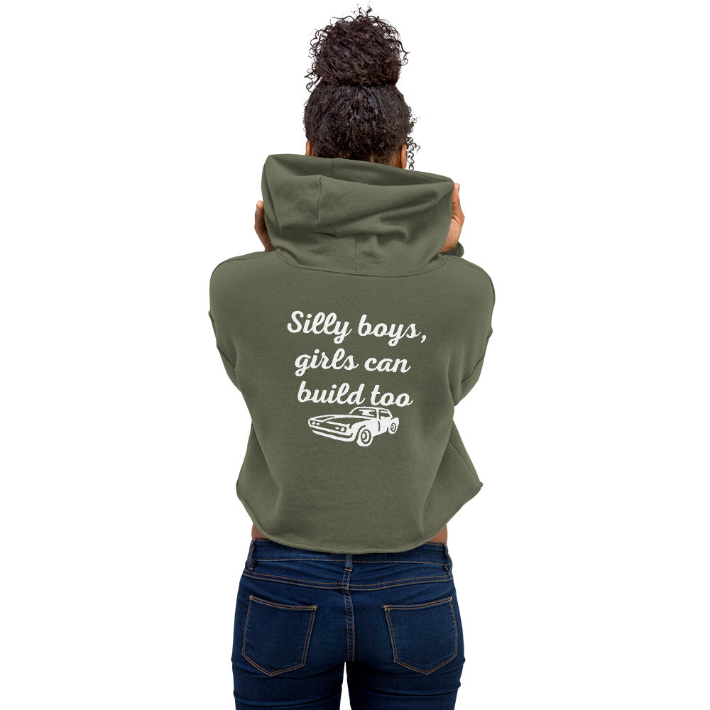 Woman wearing military green cropped hoodie with 'Silly boys, girls can build too' and car graphic, LynXautoinnovate automotive apparel
